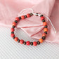Orange and Wood Recycled Bead Bracelet
